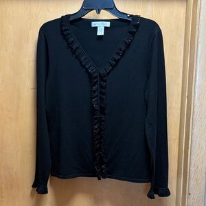 Pursuits Ltd black sweater with sequins on neckline and sleeves. Good condition.